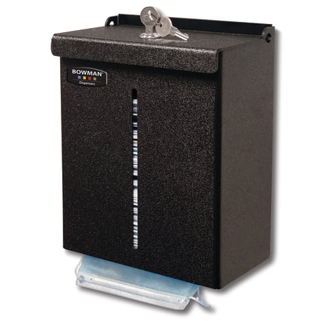 Face Mask Dispenser - Locking: This dispenser holds two - three boxes of earloop masks in bulk, It features a locking lid with a pivot hinge, Designed as a top loading, bottom dispensing product, it reduces the chances of debris, dust, or contaminants being exposed to the product inside, Keyholes for wall mounting, Constructed of durable Black ABS Plastic (Made in USA)