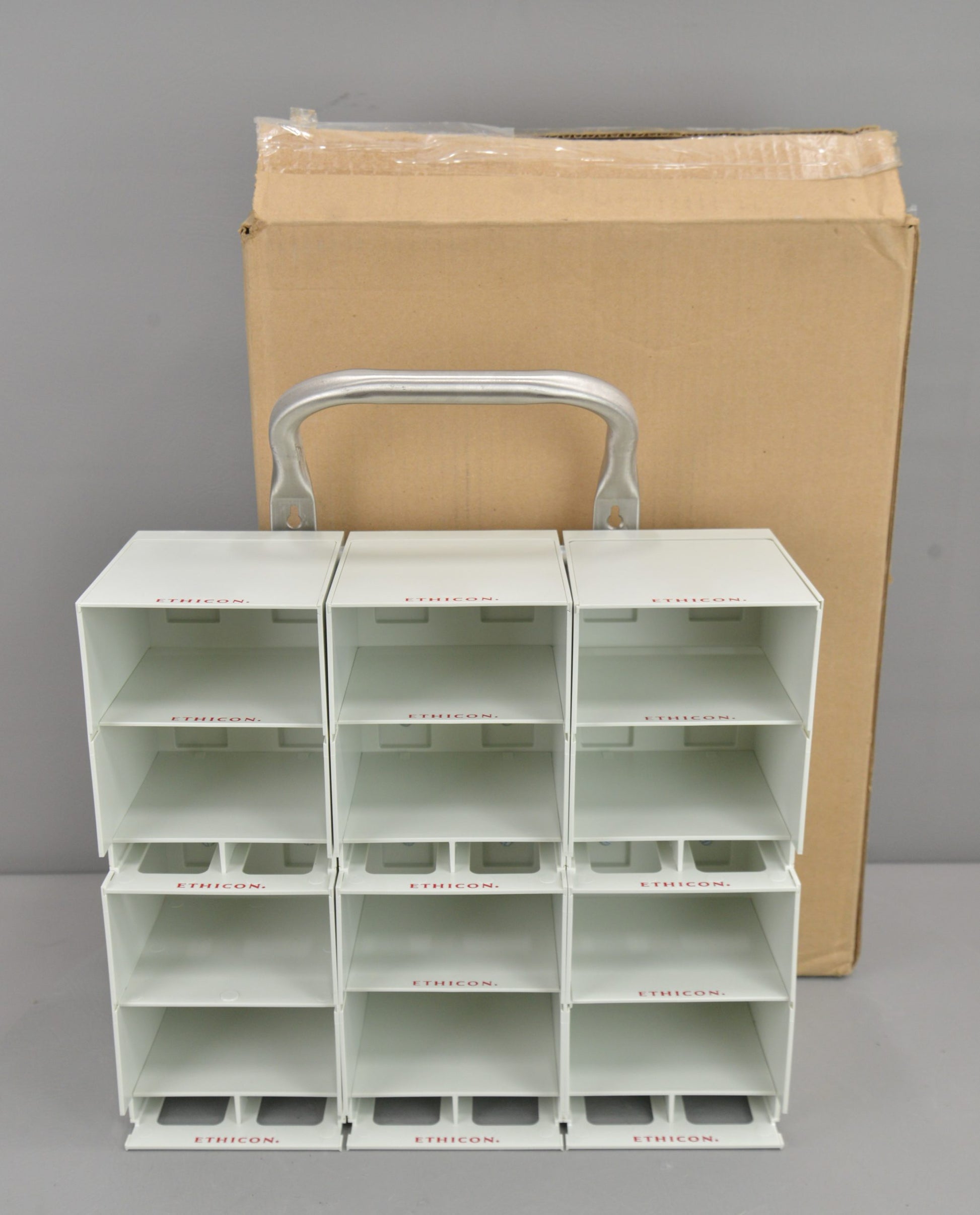 Dispenser Rack, Includes: 4 Modules, 3 Back Plates (each with 4 Fasteners), 4 Module Clips, 8 Divider Panels, Dimensions: 10_" x 5_" x 13_", Assembly Instructions sheet included, 1/bx (Continental US Only)