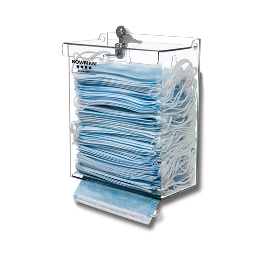 Face Mask Dispenser - Locking: This dispenser holds two - three boxes of earloop masks in bulk, It features a locking lid with a pivot hinge, Designed as a top loading, bottom dispensing product, it reduces the chances of debris, dust, or contaminants being exposed to the product inside, Keyholes for wall mounting, Constructed of durable Cherry Fauxwood ABS Plastic (Made in USA)